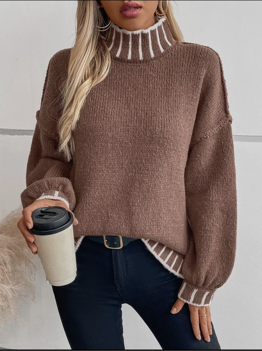 Brown sweater with white trim stitching